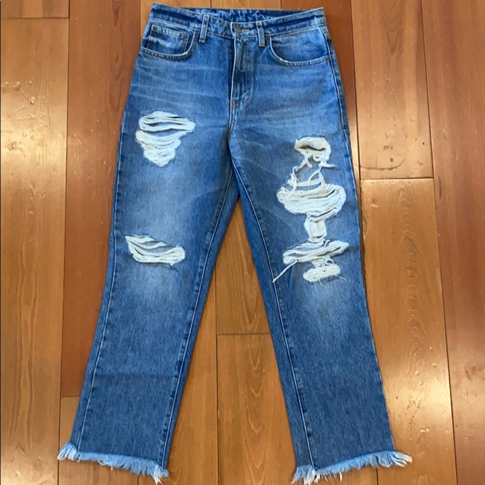 Car at Ripped Jeans